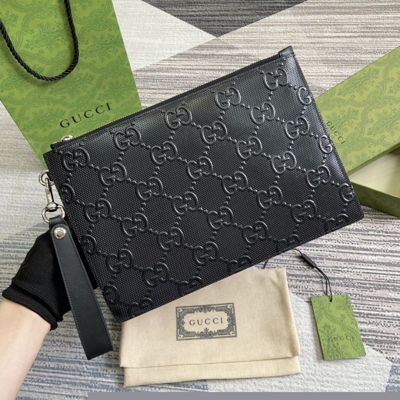 G*u*i clutch bags